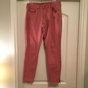 Salmon skinny jeans